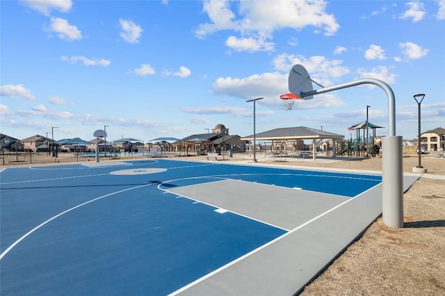 view of basketball court featuring community basketball court, fence, and a gazebo