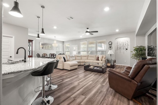 3721 Forino Dr, Round Rock, TX 78665 - living area featuring ceiling fan, dark wood finished floors, and recessed lighting