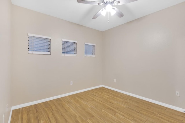 2505 San Gabriel St Unit 212, Austin, TX 78705 - unfurnished room featuring light wood finished floors, baseboards, and a ceiling fan