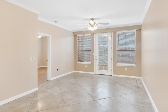 2505 San Gabriel St Unit 212, Austin, TX 78705 - empty room with ceiling fan, crown molding, baseboards, and light tile patterned floors