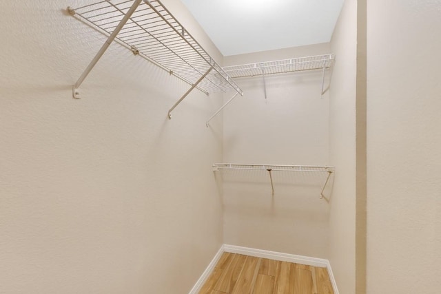 2505 San Gabriel St Unit 212, Austin, TX 78705 - spacious closet with wood finished floors