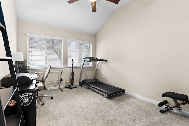 exercise area with carpet, vaulted ceiling, baseboards, and ceiling fan