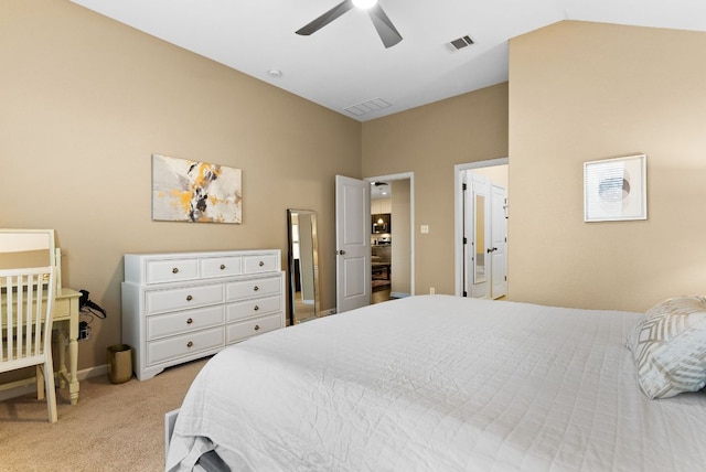 bedroom featuring light carpet, ceiling fan, visible vents, and vaulted ceiling