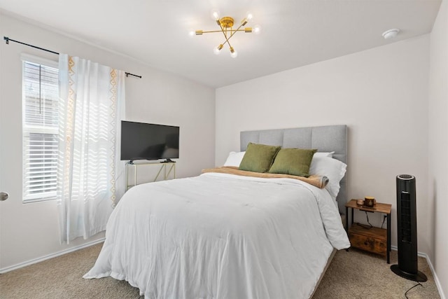 bedroom featuring light carpet, baseboards, and a notable chandelier