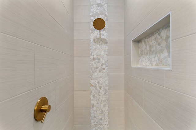 details featuring a tile shower