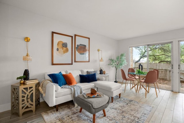 living area featuring light wood-style flooring