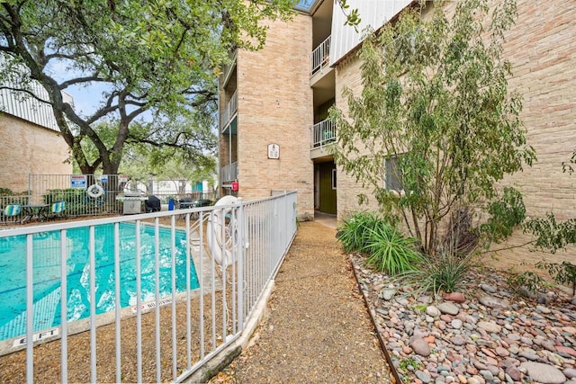 community pool with fence