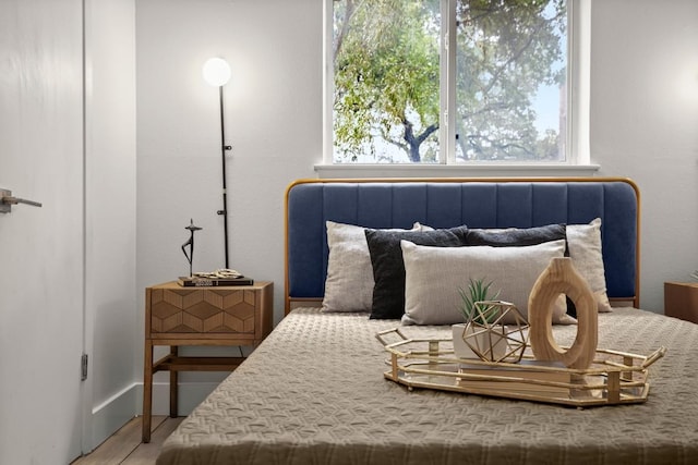 620 S 1st St Unit 104, Austin, TX 78704 - bedroom featuring wood finished floors