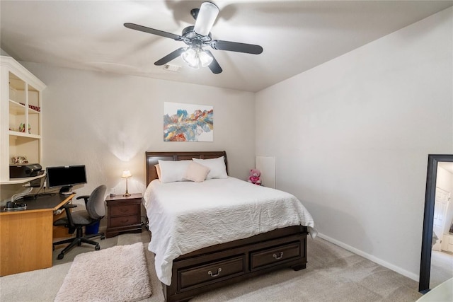 bedroom with light carpet, baseboards, visible vents, and ceiling fan