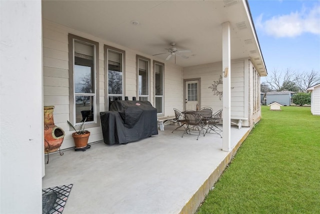 view of patio with a ceiling fan and a grill