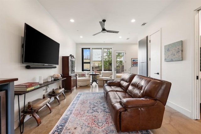 living area with ceiling fan, recessed lighting, concrete floors, visible vents, and baseboards