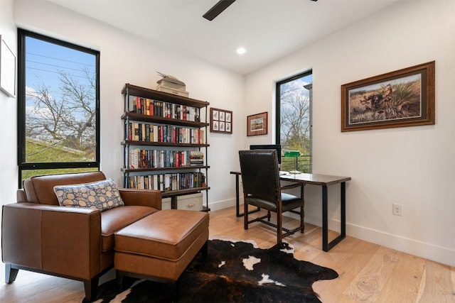 home office featuring a ceiling fan, recessed lighting, baseboards, and light wood finished floors