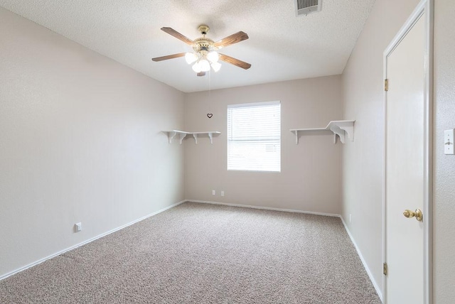 8507 Chat Ln, Round Rock, TX 78681 - unfurnished room featuring ceiling fan, carpet floors, and a textured ceiling