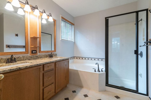 8507 Chat Ln, Round Rock, TX 78681 - bathroom featuring a garden tub, double vanity, and a shower stall