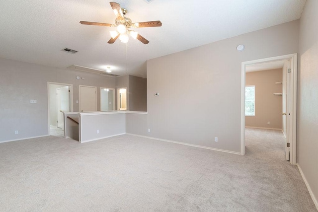 8507 Chat Ln, Round Rock, TX 78681 - empty room with a ceiling fan, attic access, light carpet, and a smoke detector