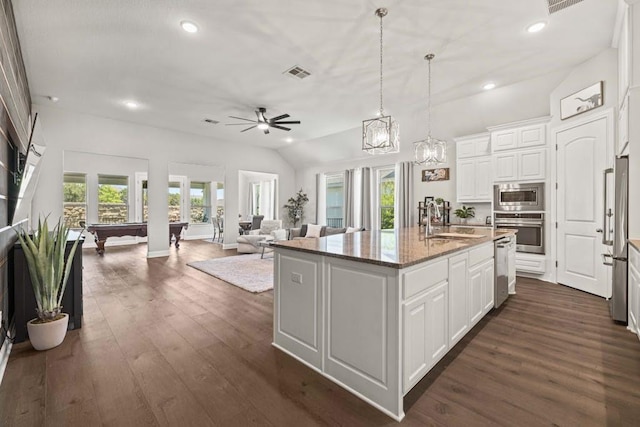 1820 Ficuzza Way, Leander, TX 78641 - kitchen with stainless steel appliances, a sink, billiards table, a ceiling fan, and stone counters