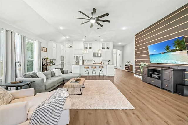 1820 Ficuzza Way, Leander, TX 78641 - living area with ceiling fan, light wood-style flooring, and recessed lighting