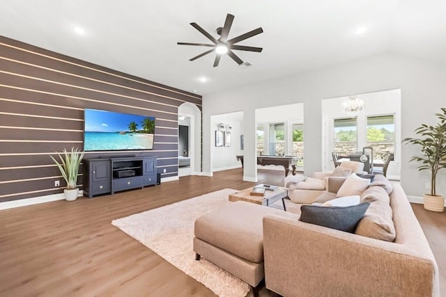 1820 Ficuzza Way, Leander, TX 78641 - living room featuring wood finished floors, ceiling fan, a chandelier, baseboards, and recessed lighting