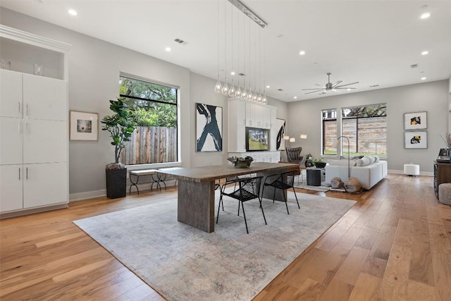 4907 Timberline Dr, Austin, TX 78746 - dining room with healthy amount of natural light, light wood-style flooring, recessed lighting, and ceiling fan