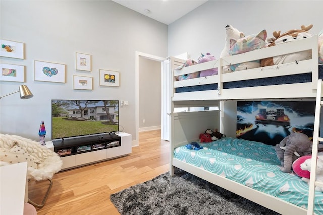 4907 Timberline Dr, Austin, TX 78746 - bedroom featuring wood finished floors