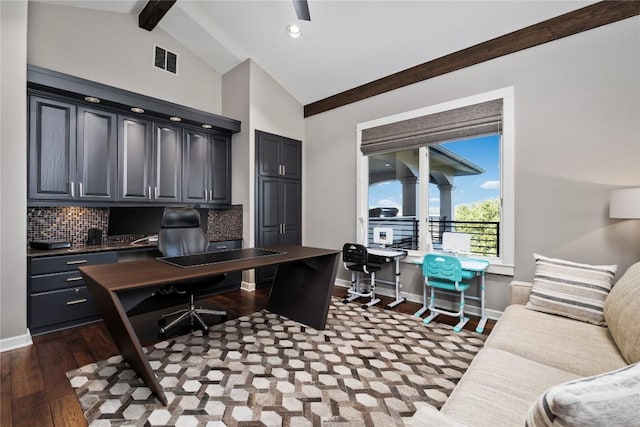 office space featuring baseboards, visible vents, dark wood-type flooring, high vaulted ceiling, and beam ceiling