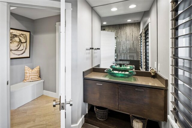 15210 Rainbow One St, Austin, TX 78734 - bathroom with recessed lighting, vanity, and baseboards