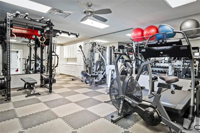 15210 Rainbow One St, Austin, TX 78734 - exercise room featuring a ceiling fan and tile patterned floors