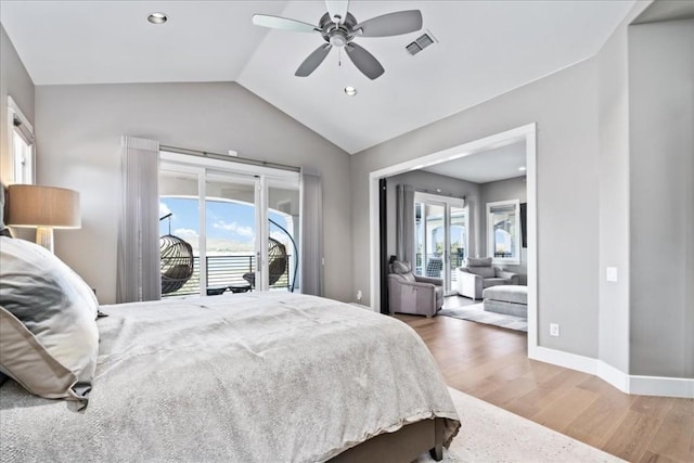 15210 Rainbow One St, Austin, TX 78734 - bedroom featuring access to outside, lofted ceiling, multiple windows, light wood finished floors, and recessed lighting