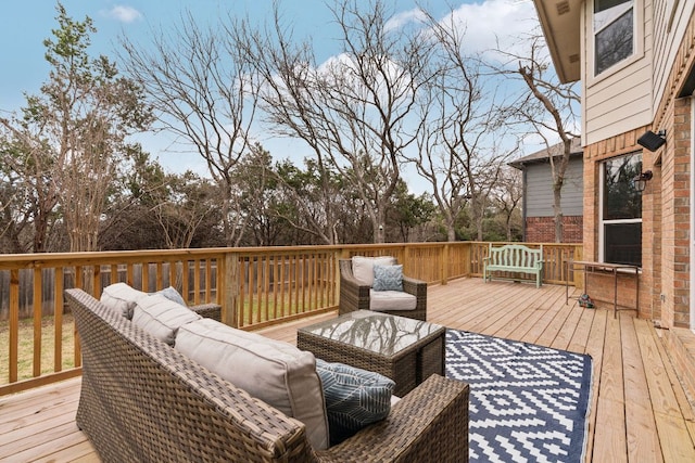 wooden terrace featuring outdoor lounge area