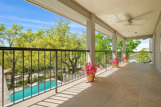 balcony featuring ceiling fan