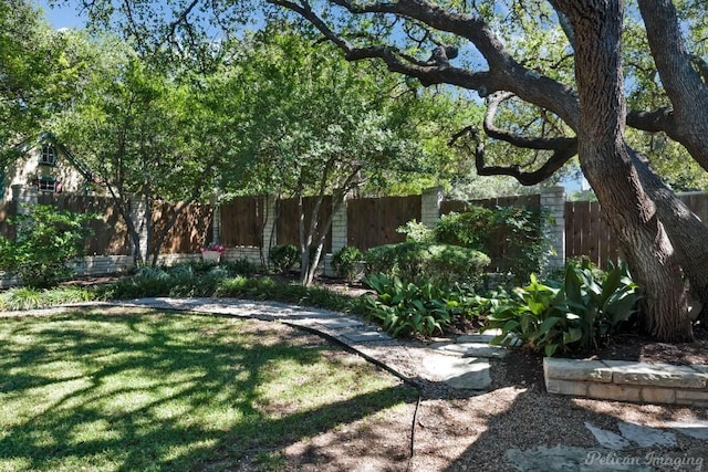 view of yard featuring fence