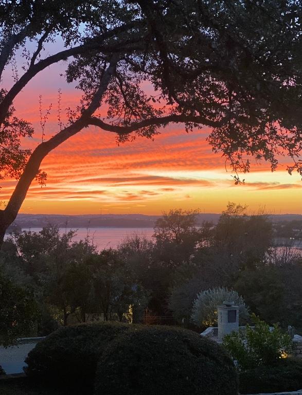 126 Firebird St, Lakeway, TX 78734 - nature at dusk featuring a water view