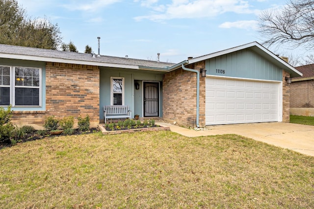 ranch-style house with a garage, a front lawn, concrete driveway, and brick siding