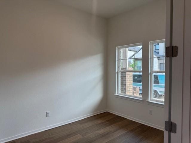 2705 Sage Ranch Dr Unit 24, Leander, TX 78641 - unfurnished room with dark wood finished floors and baseboards