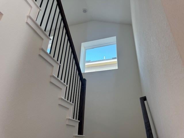 2705 Sage Ranch Dr Unit 24, Leander, TX 78641 - staircase featuring vaulted ceiling
