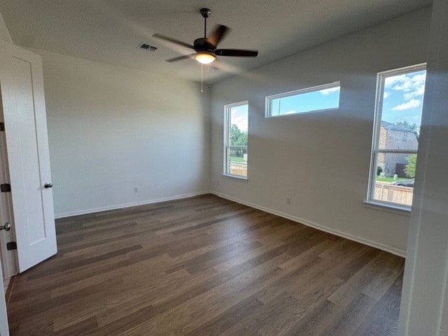 2705 Sage Ranch Dr Unit 24, Leander, TX 78641 - spare room featuring dark wood-type flooring and a ceiling fan