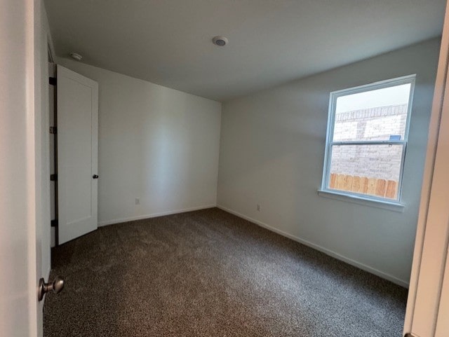 2705 Sage Ranch Dr Unit 24, Leander, TX 78641 - carpeted spare room with baseboards
