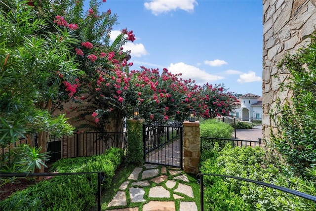 view of gate featuring fence