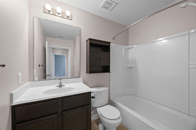 bathroom with a textured wall, toilet, visible vents, vanity, and tub / shower combination