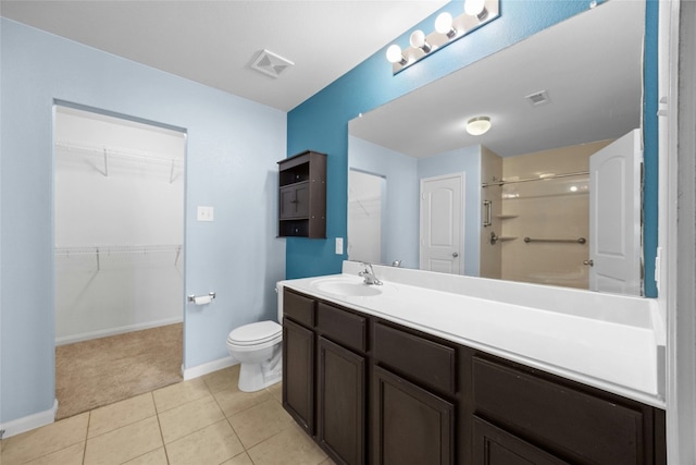 full bathroom with tile patterned flooring, toilet, vanity, visible vents, and baseboards