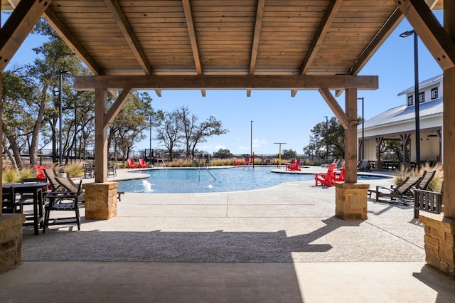 pool featuring a patio area