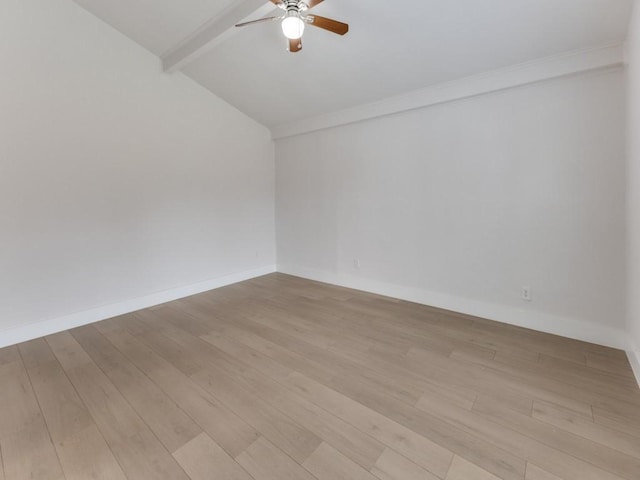 empty room featuring vaulted ceiling with beams, light wood finished floors, ceiling fan, and baseboards