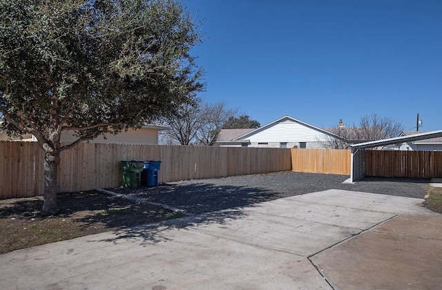 exterior space with a fenced backyard