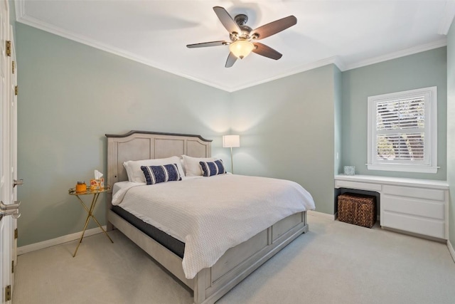 bedroom featuring ceiling fan, baseboards, crown molding, and light colored carpet