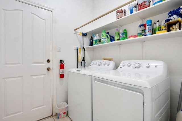 washroom featuring laundry area and independent washer and dryer