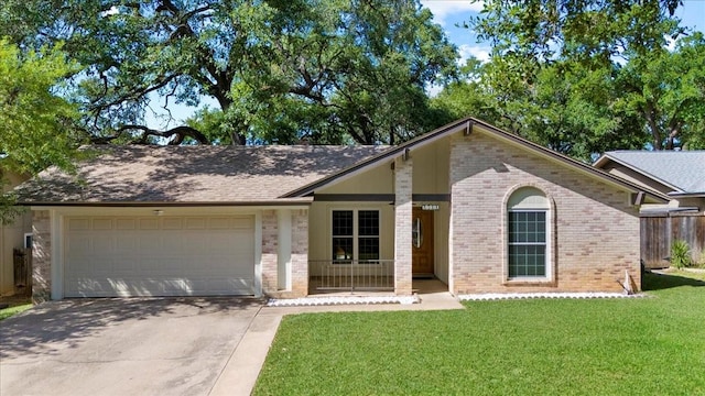 single story home featuring concrete driveway, brick siding, a front lawn, and an attached garage