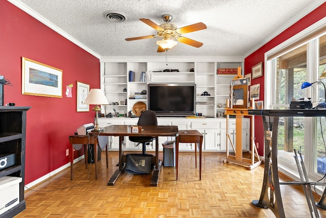 office featuring built in features, baseboards, visible vents, and a textured ceiling