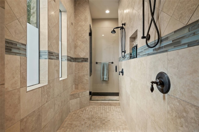 bathroom featuring tiled shower