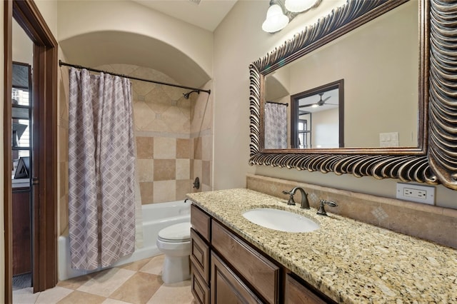 bathroom with vanity, toilet, and shower / bath combo with shower curtain