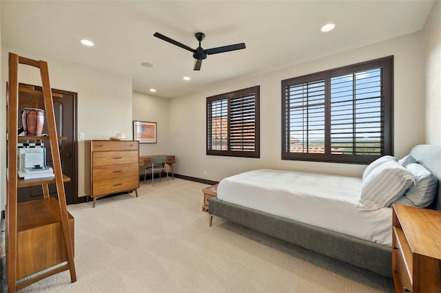 bedroom with recessed lighting, light colored carpet, ceiling fan, and baseboards